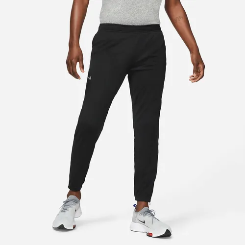 Pantalon nike con botones hot sale