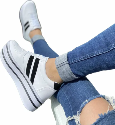 Tenis blancos con rayas negras new arrivals