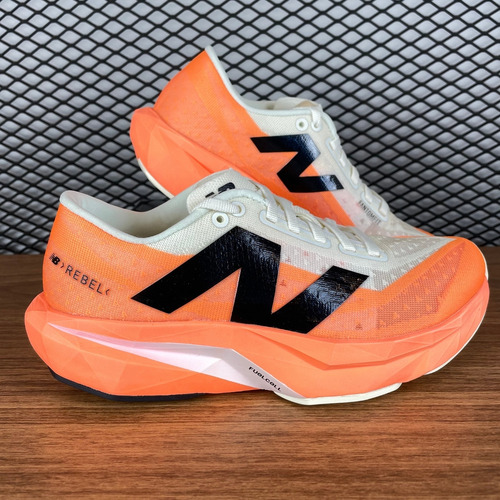 Tênis Corrida New Balance Fuelcell Rebel V4 Laranja Feminino