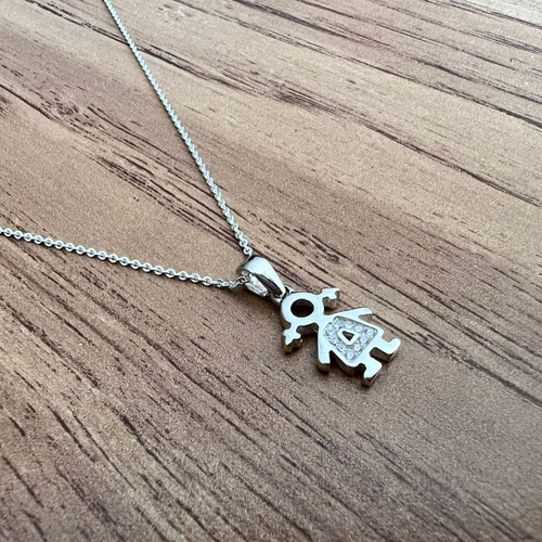 Imagen 3 de 10 de Dije Niño Circonias Y Plata .925 Agálea Joyería