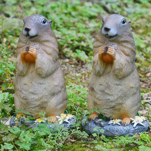 Apoyos De La Foto De La Escultura Del Jardín De La Marmota