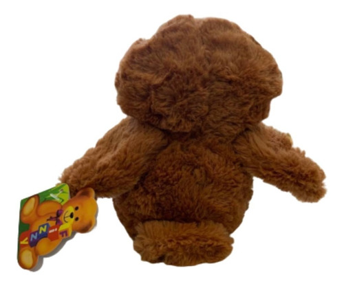 Imagem 3 de 3 de Coruja Marrom De Pelúcia Olhão Com Peito Oncinha 18cm