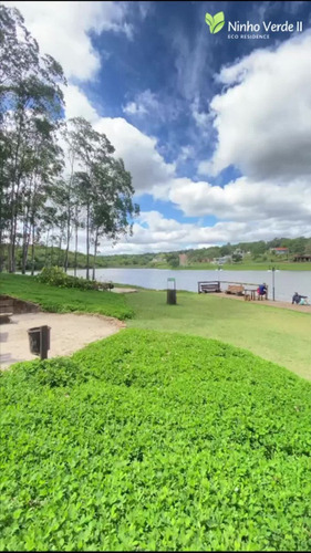Terreno - Condomínio Luxuoso Ninho Verde I I Eco Residence-dois Clubes Com Piscinas,segurança 24 Hrs,playground,trilhas Ecológicas,ônibus Local.fotos Reais Do Terreno-quitado/iptu E Condomínio Em Dia