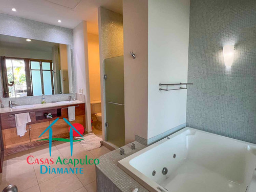 Cad Mayan Lakes 16 302. Amplia Terraza Con Vista A Las Áreas Comunes Y Acceso A Un Exclusivo Club De Playa