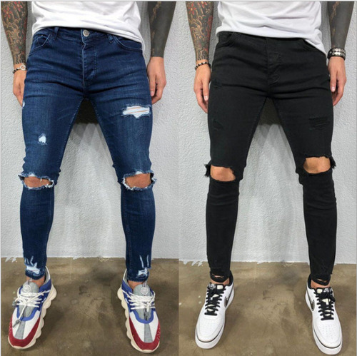 Vaqueros A La Moda Con Piernas Ajustadas Y Elásticas Rasgada