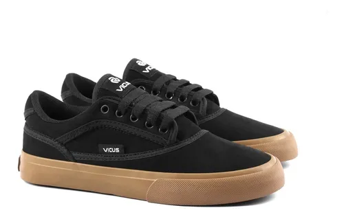 Zapatilla negra suela marron sales