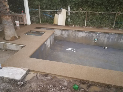 Imagen 8 de 10 de Revestimiento Fulget Y Borde De Hormigón Piscinas De Fibra