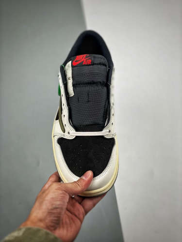 Jordan's 1 Low Travis Reverse Mocha + Olive - Jonathan
