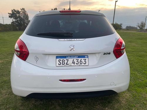 Imagen 9 de 16 de Peugeot 208 2015 1.0 Access 5p Francés