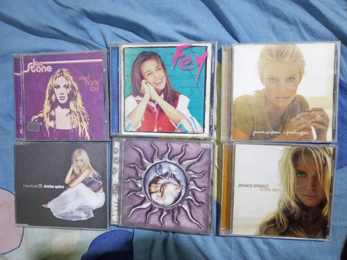 Discos Fey, Jessica Simpson, Joss Stone Y Xtina Single