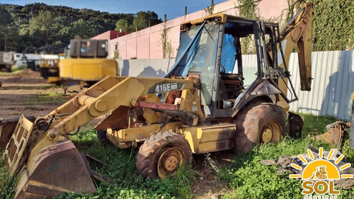 Retroescavadeira 416e Caterpillar Sendo Desmontada Em Peças