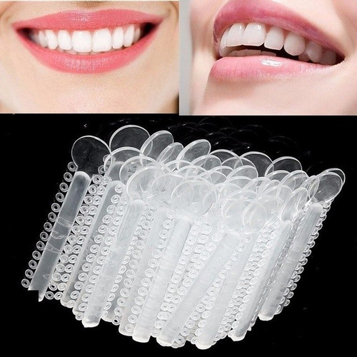 Imagen 1 de 2 de Ligaduras Ortodoncia Elásticos Transparentes O Plateadas