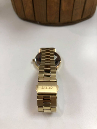 Relógio Feminino Orient Dourado Fgss0110 B1kx= 13