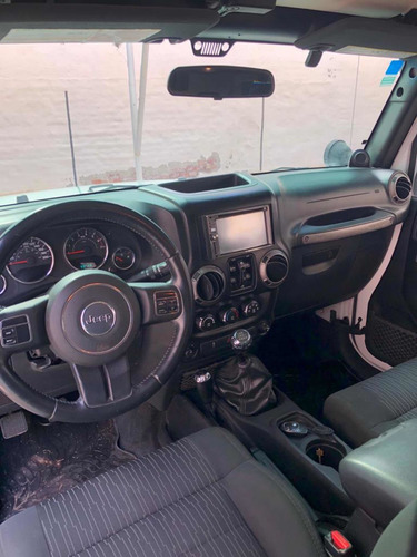Imagen 7 de 10 de Jeep Wrangler 2011 3.8 Sport Unlimited 199cv Mtx