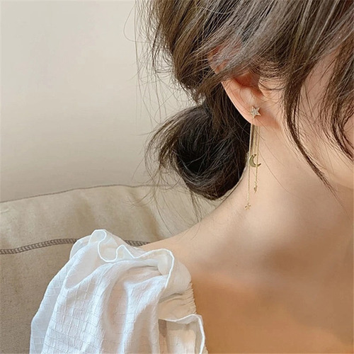 Imagen 3 de 4 de Aretes Mujer Largos Dorados Estrella Luna Moda Circonias