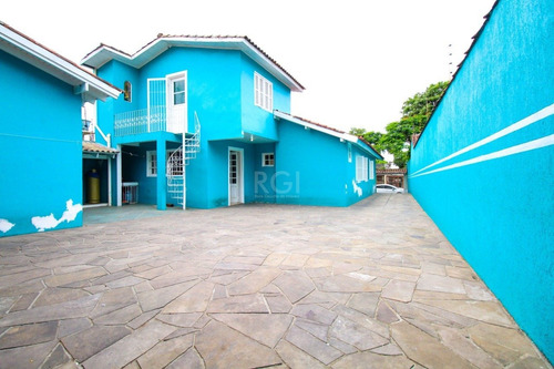 Casa Em Porto Alegre Com 3 Dormitórios - Ot7083