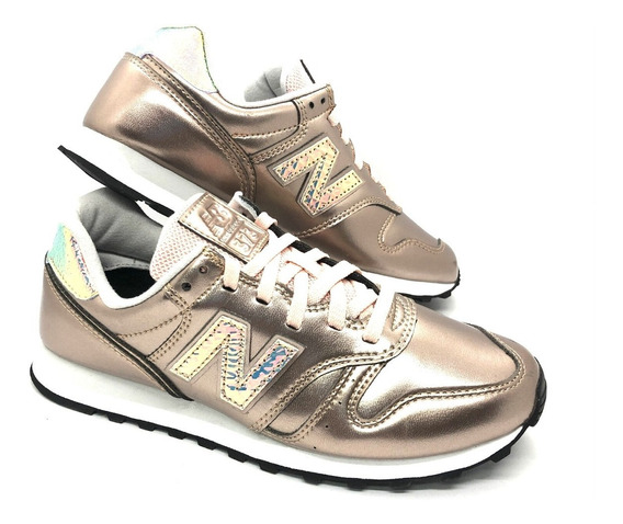 new balance doradas mujer