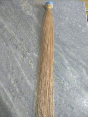 Imagem 4 de 5 de Cabelo Humano Loiro Fita Adesiva Inteira 50g 55cm Mega Hair