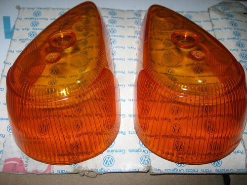 Imagem 2 de 6 de Par Lentes Fusca Itamar Série Ouro Sorriso Largo Com Logo Vw