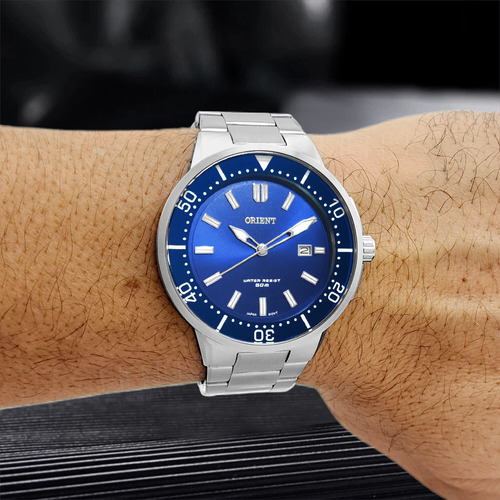 Relógio De Pulso Orient Com Corria De Aço Inoxidável Cor Prateado - Fondo Azul-marinho