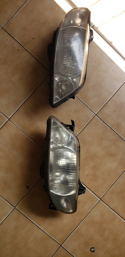 Faros Mazda Alegro 2005 