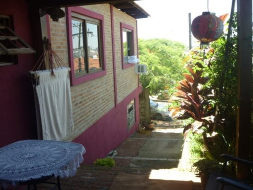 Casa Em Tristeza Com 3 Dormitórios - Mi13424