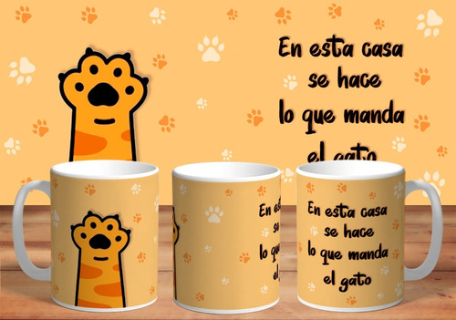 Taza   En Esta Casa Se Hace Lo Que Manda El Gato  Cerámica