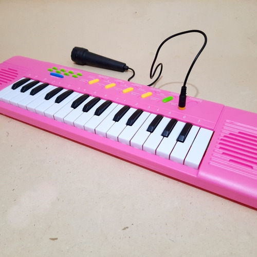 Imagem 7 de 7 de Teclado Infantil Rosa Com Microfone - Musical Resistente