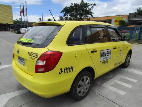Taxi Skoda Fabia Combi, Taxis Libres Automóvil Modelo 2015.