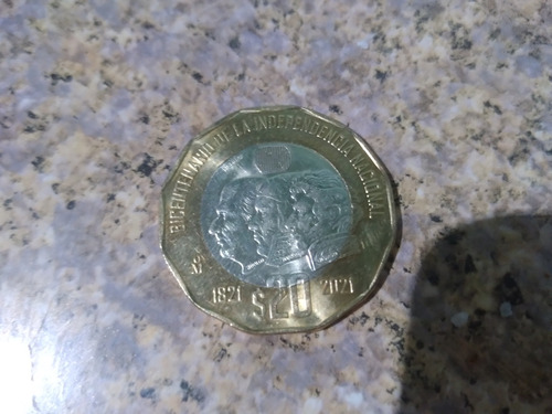 Es Una Moneda De 20 Pesos 