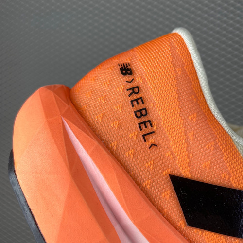 Tênis Corrida New Balance Fuelcell Rebel V4 Laranja Feminino