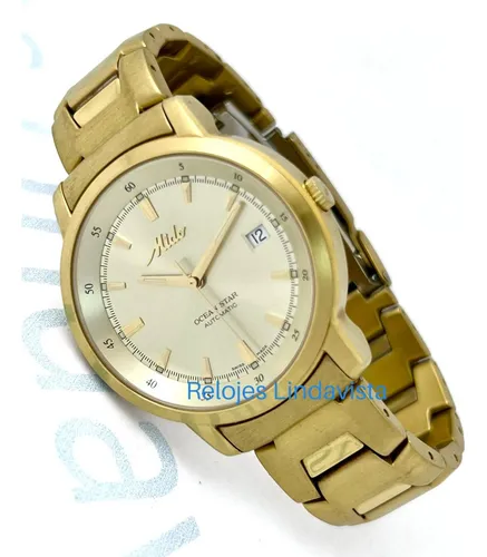 Reloj mido ocean star dorado sale