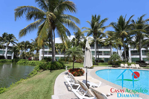 Cad Mayan Lakes 1-501. En Condominio Con Club De Playa. Terraza Con Vista A La Alberca Y Jardines