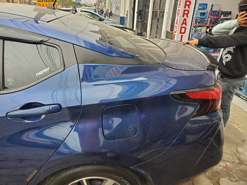 Imagen 4 de 4 de Spoiler Aleron Cola De Pato Lip Nissan Versa Sense 2020 2023