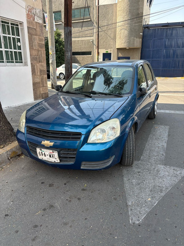 Chevrolet Chevy Color Azul Hatchback De 5 Puertas.