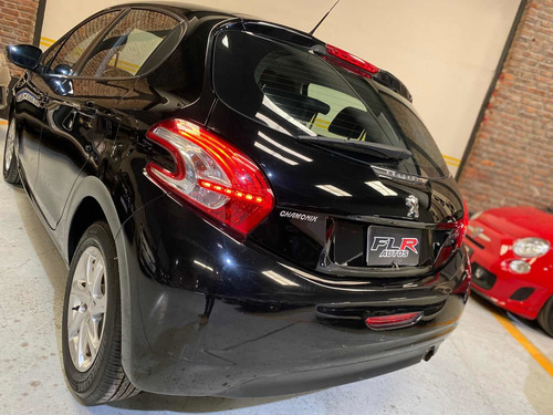 Imagen 8 de 13 de Peugeot 208 1.5 Allure 2013