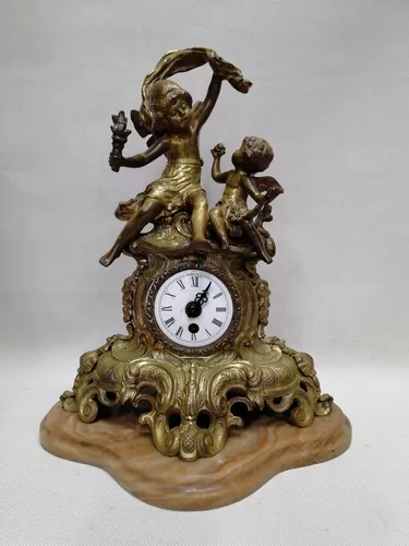Reloj de mesa en aleación de bronce. Base de mármol. Años 80.