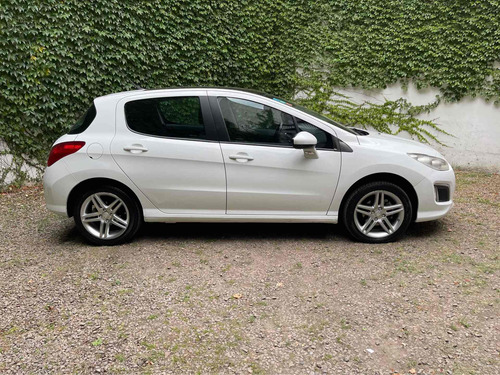 Imagen 11 de 19 de Peugeot 308 2012 2.0 Feline 143cv Tiptronic