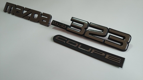 Mazda 323 Coupé Emblemas Tapa Baúl