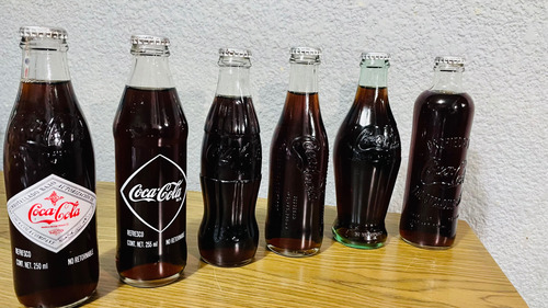 Colección De Botellas De Coca Cola