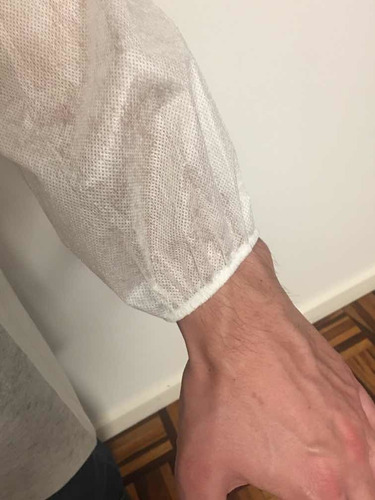 Imagem 3 de 3 de Pacote Com 10 - Avental Hospitalar Descartável Tnt 40gr