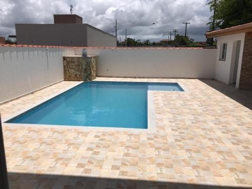 Imagem 4 de 14 de Casa Com Piscina Em Condomínio De Frente Pro Mar Em Itanhaém