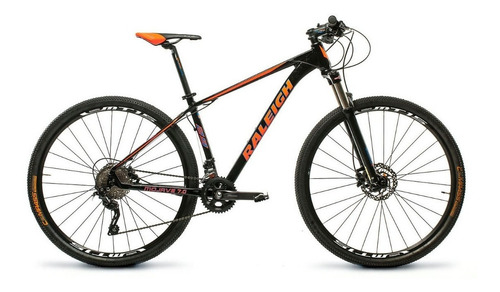 Mountain bike Raleigh Mojave 7.0 R29 15" 20v frenos de disco hidráulico cambios Shimano Deore M6025 y Shimano Deore M6000-SGS color negro/naranja/azul  