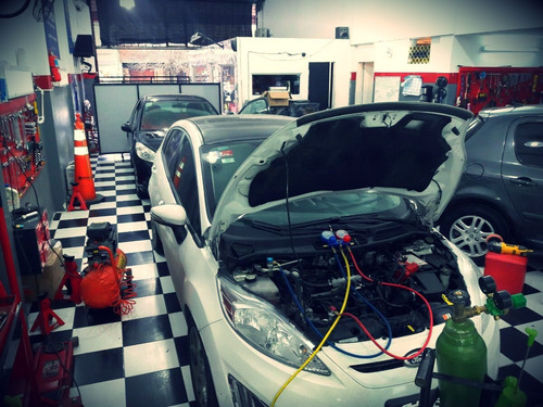 Imagen 4 de 10 de Carga Y Diagnostico Computarizado Aire Acondicionado Autos