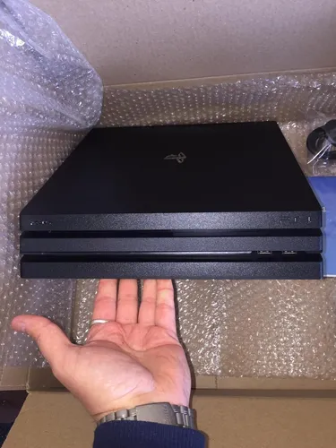 Sony Ps4 Pro 1tb 4k 11 Juegos + Auricular + Kit Dust Color Negro Azabache