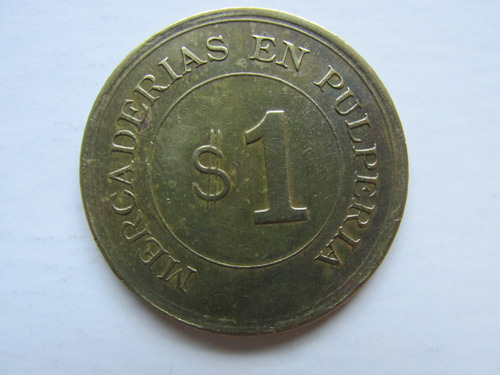 Antigua Ficha Salitrera Of Britania Vale $ 1 Peso Mercaderia (Usado)