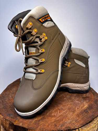 Bota Botina Couro Caterpillar Cano Médio Solado Tratorado