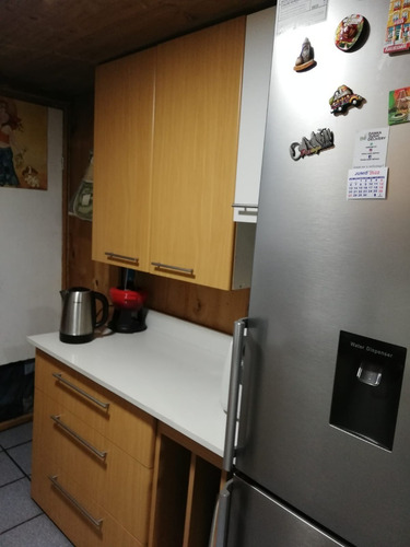 Casa Muy Bien Tenida / Cerro 18 Sur