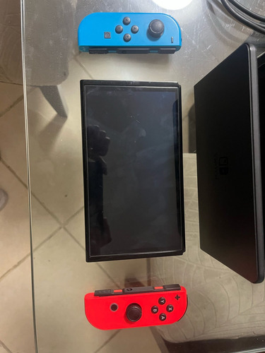 Consola Nintendo Switch Oled Rojo Y Azul Neón (Usado)