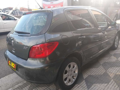Imagem 5 de 13 de Peugeot 307 2009 1.6 Presence Flex 5p
